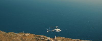 Hélicoptère Hélittoral au-dessus du cap Béar et de son phare